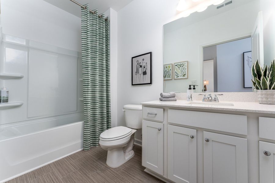 Furnished interior view inside a new home in Marlin Pointe, White House (Image 2).