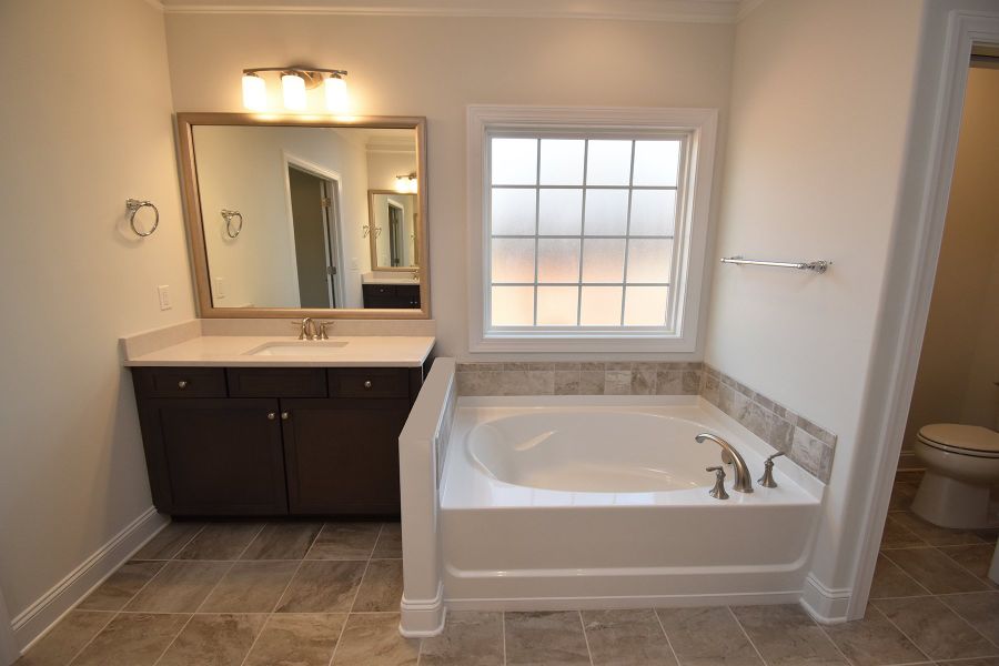 Representative furnished interior of a home built from the Cambridge by Keystone Homes NC in Weybridge, Burlington (Image 14).