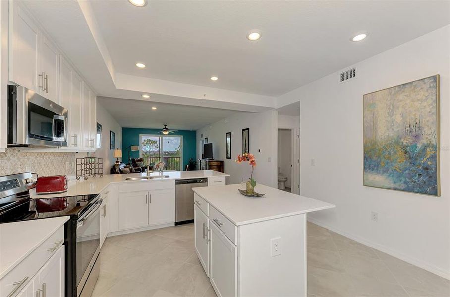 Furnished interior view inside a new home in Wellen Park Golf & Country Club, Venice (Image 16).