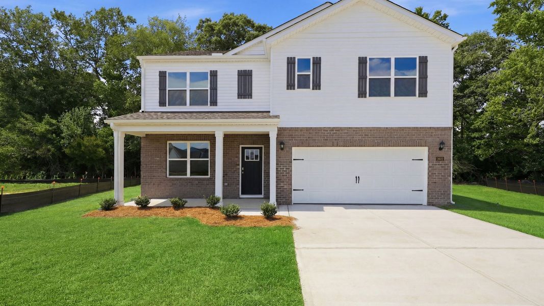 Front exterior of a new home in Villa Grande, Winterville, NC, highlighting curb appeal (Image 1). Front exterior of a new home in Villa Grande, Winterville, NC, highlighting curb appeal (Image 1).