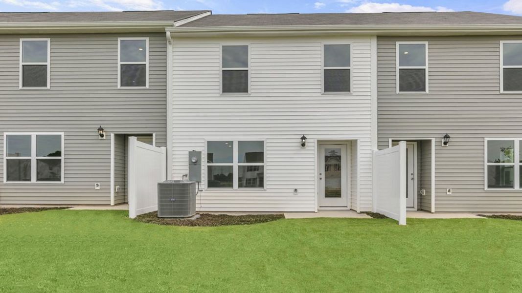 Exterior details and patio area of a home in The Townes at Wilson's Ridge, Smithfield (Image 3).