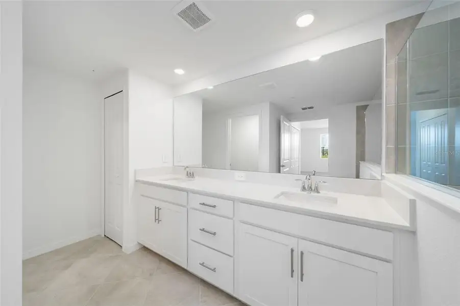 Furnished interior view inside a new home in Calusa Country Club, Lakewood Ranch (Image 6).