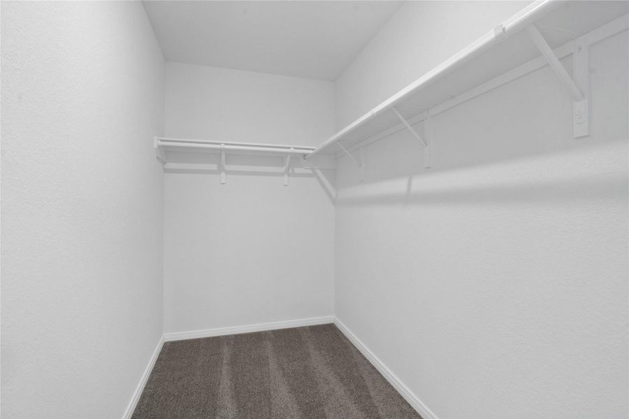 Look at this immaculate closet! With high shelving, multiple rows to hang clothing, you are sure to have enough room for all your belongings!