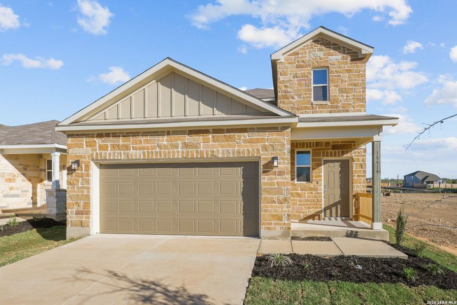Front exterior of a new home in Summerlin, San Antonio, TX, highlighting curb appeal (Image 1). Front exterior of a new home in Summerlin, San Antonio, TX, highlighting curb appeal (Image 1).