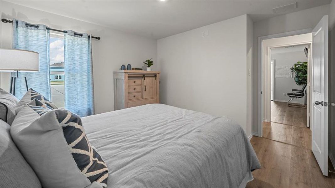 Bedroom featuring wood finished floors