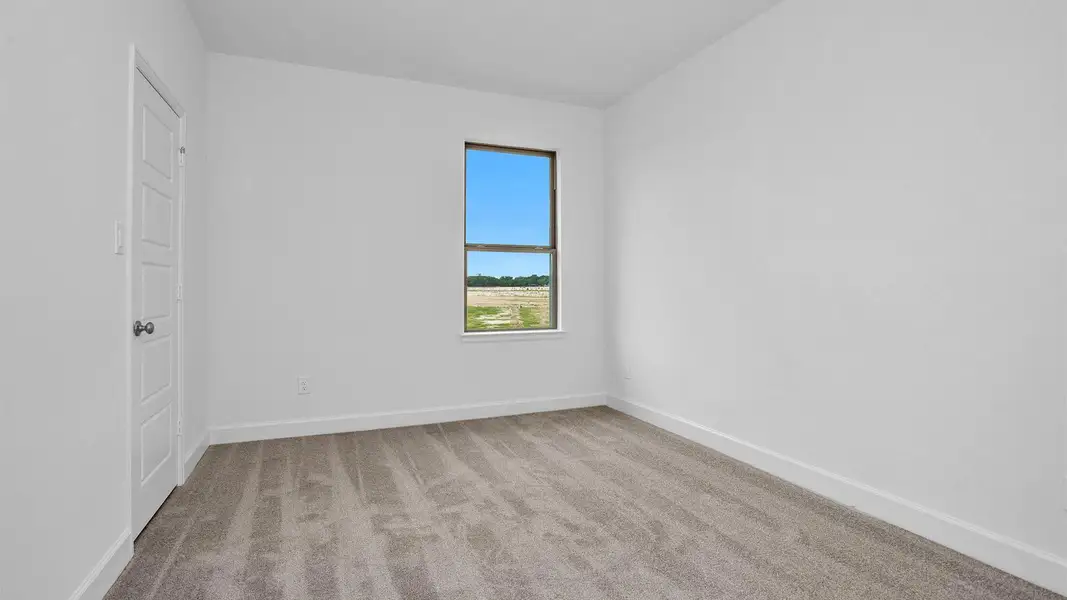 Spacious, unfurnished interior of a new home in Legacy Prairie at Katy Court, Katy (Image 13).
