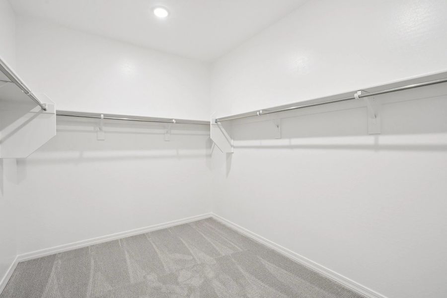 Primary walk in closet Primary walk in closet