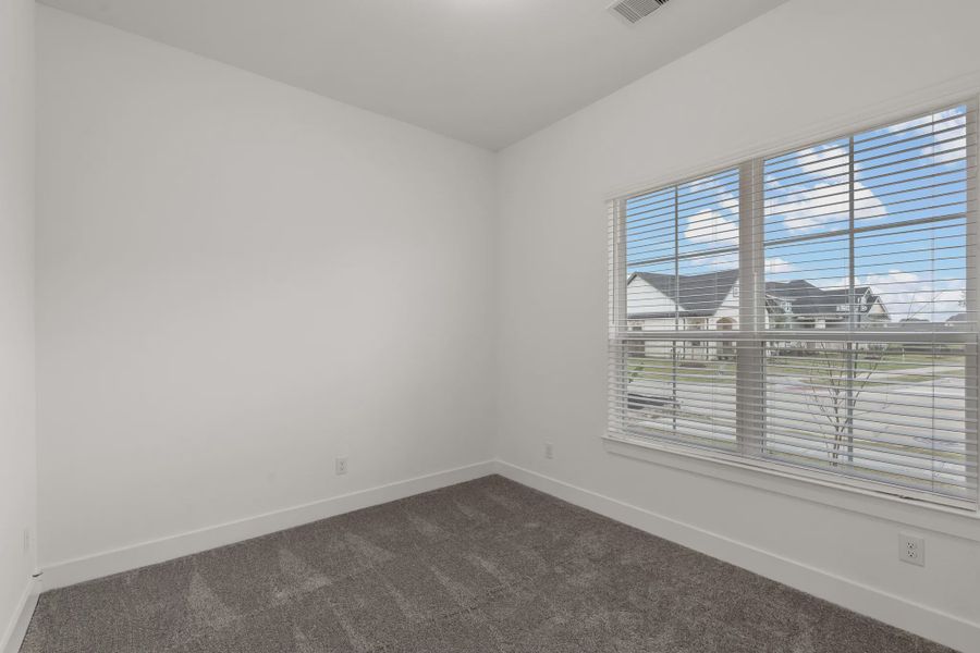 Representative unfurnished interior of a home built from the Fairway by Chesmar Homes in Riceland Alley Loads, Mont Belvieu (Image 14).