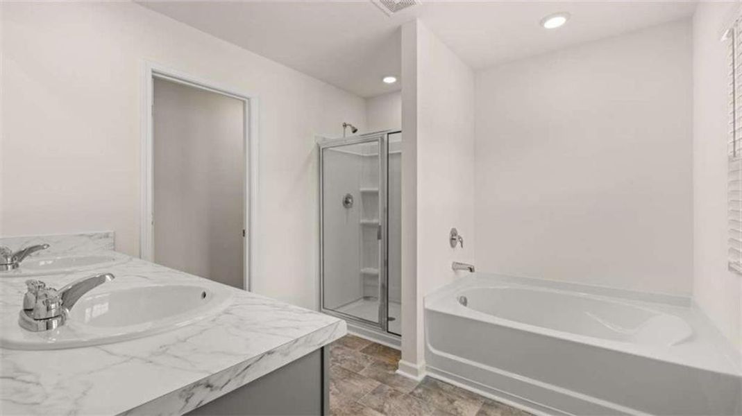 Furnished interior view inside a new home in Oakchase at Hampton, Hampton (Image 10).