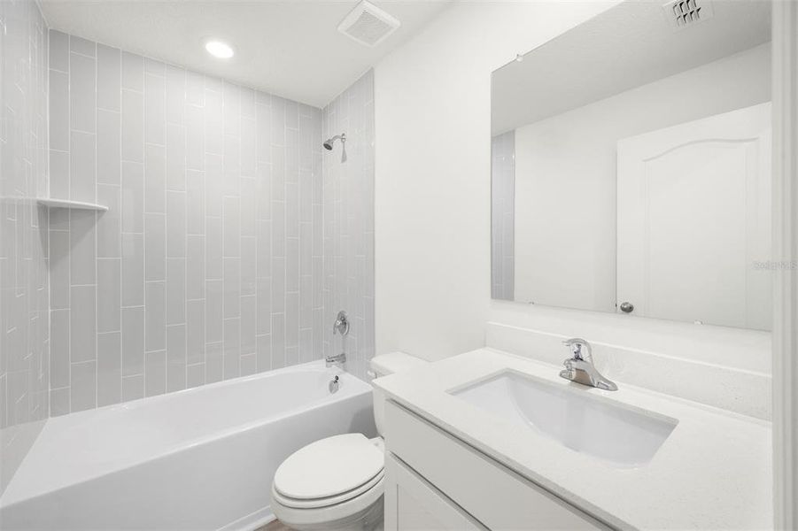 Furnished interior view inside a new home in Tula Parc, Astatula (Image 6).