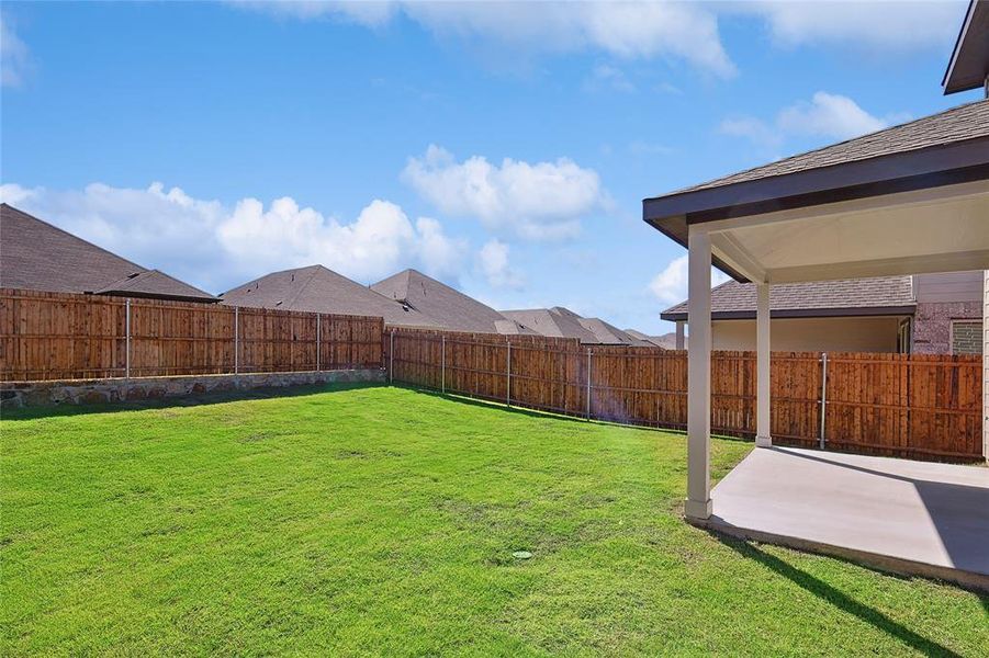 View of yard with a patio area