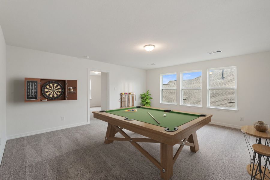 Game room. Note: Sample product photo - actual exterior and interior selections may vary by homesite