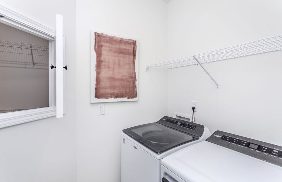Laundry Room with Convenient Walk-In Closet Access