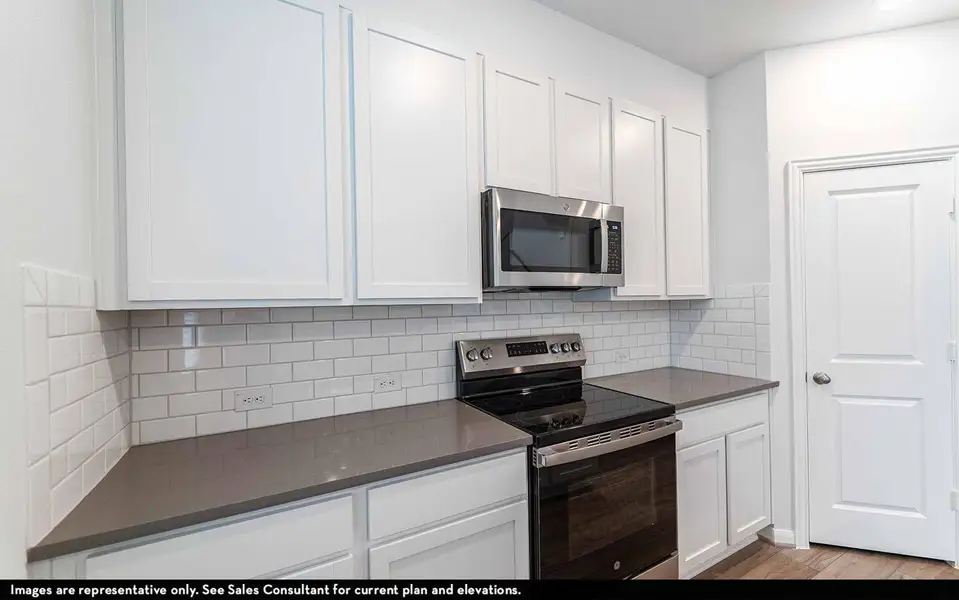 Furnished interior view inside a new home in Municipal Drive Townhomes, Leander (Image 2).