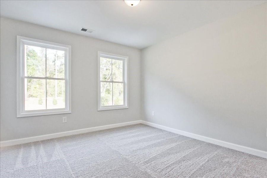 Spacious, unfurnished interior of a new home in Cherokee Township, Acworth (Image 35).