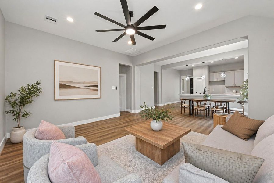 Welcoming entry with high ceilings and an open-concept layout that immediately feels bright and spacious.