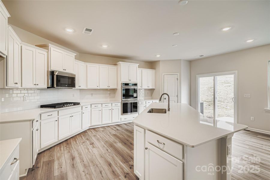 Furnished interior view inside a new home in Shannon Woods: Walk & Enclave, Maiden (Image 5).