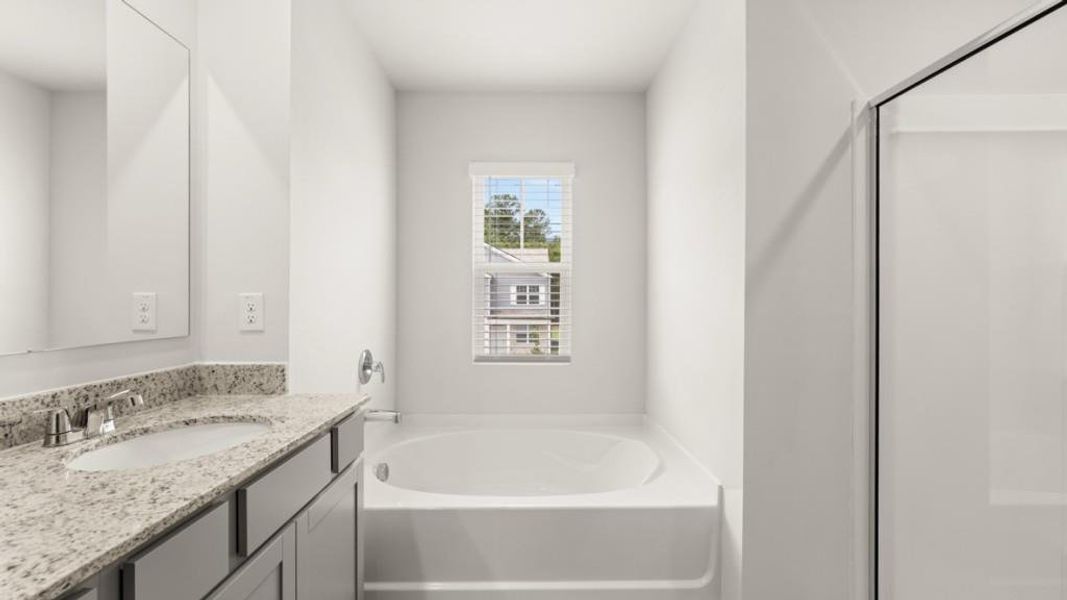 Furnished interior view inside a new home in Oaks at Cedar Grove, Fairburn (Image 10).