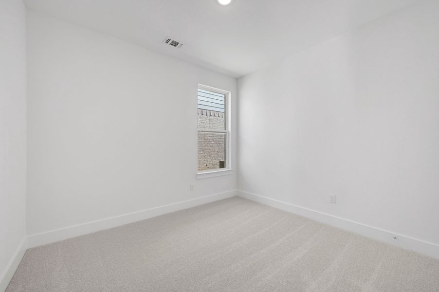 Spacious, unfurnished interior of a new home in The Meadows, Denton (Image 22).