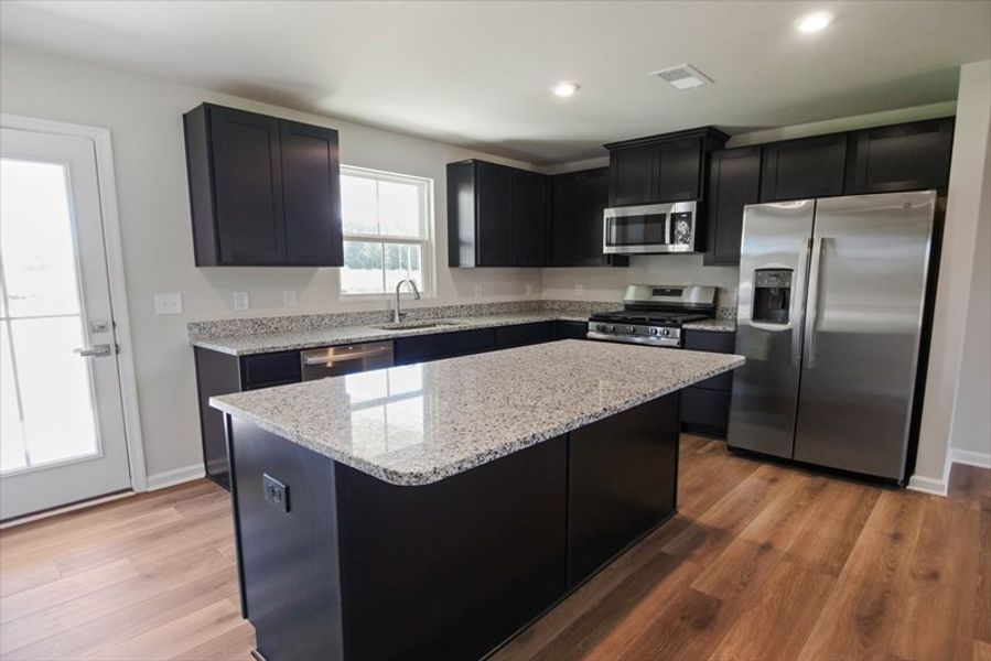 Furnished interior view inside a new home in Bronson Ridge, Greenwood (Image 3). Furnished interior view inside a new home in Bronson Ridge, Greenwood (Image 3).