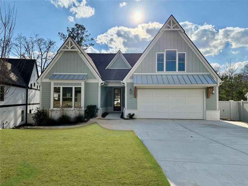 Front exterior of a new home in Gardens at Arbor Springs, Newnan, GA, highlighting curb appeal (Image 1).
