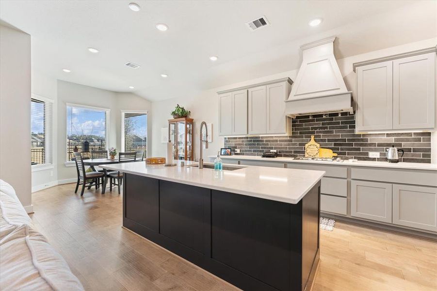 Large kitchen island is perfect for seating or hosting gatherings