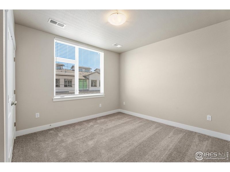 Spacious, unfurnished interior of a new home in Northfield - The Flats, Fort Collins (Image 14).