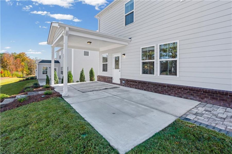 Exterior details and patio area of a home in Berkeley Mill, Cumming (Image 4). Exterior details and patio area of a home in Berkeley Mill, Cumming (Image 4).