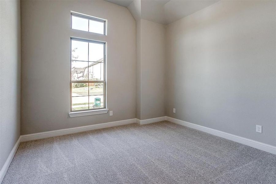 Unfurnished room with carpet flooring