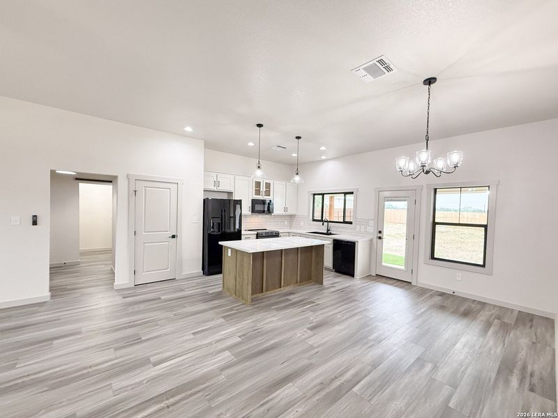 Furnished interior view inside a new home in , Devine (Image 8).