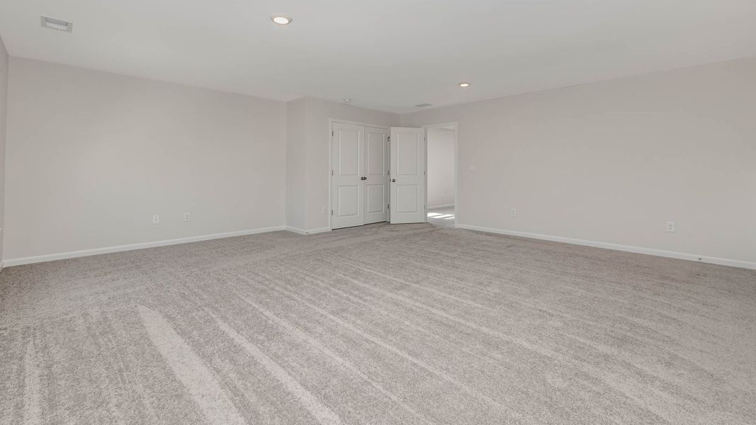 Representative unfurnished interior of a home built from the Wren by D.R. Horton in Cedar Hill Landing, Navassa (Image 26).