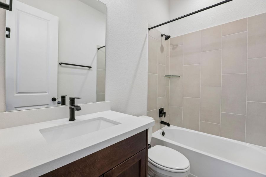 Furnished interior view inside a new home in 6 Creeks, Kyle (Image 12).