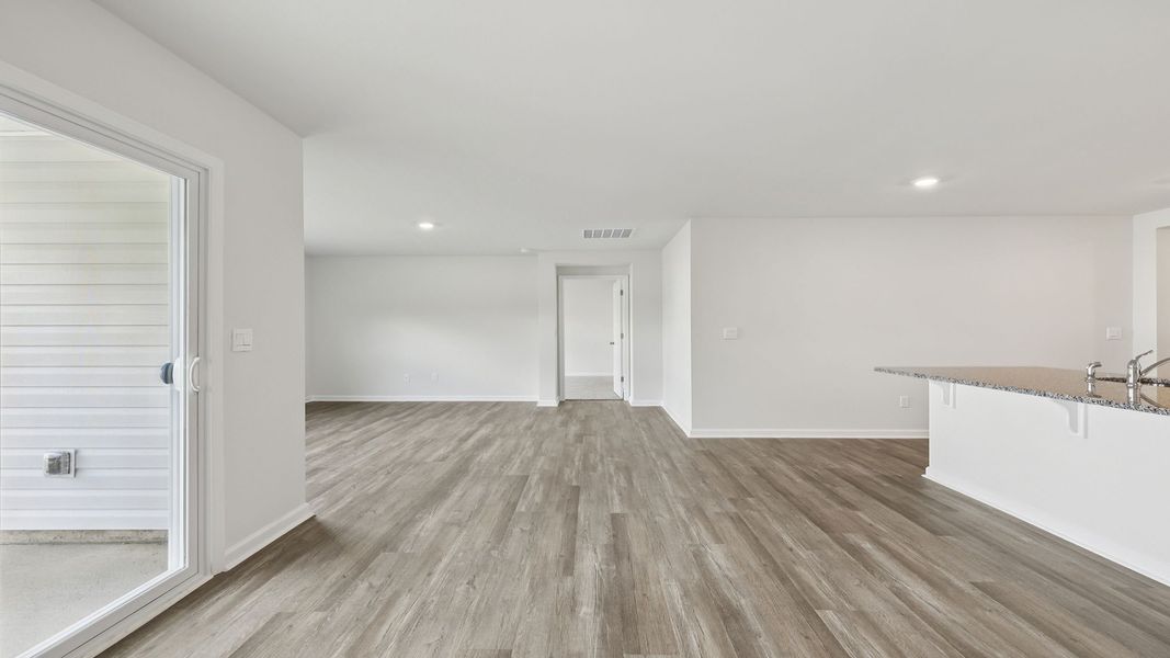 Spacious, unfurnished interior of a new home in Bentley Park, Greenwood (Image 23).