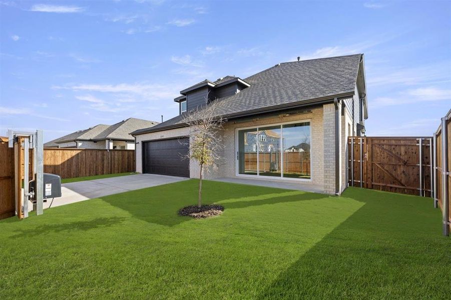 Exterior details and patio area of a home in Trails at Cottonwood Creek, Rowlett (Image 3).