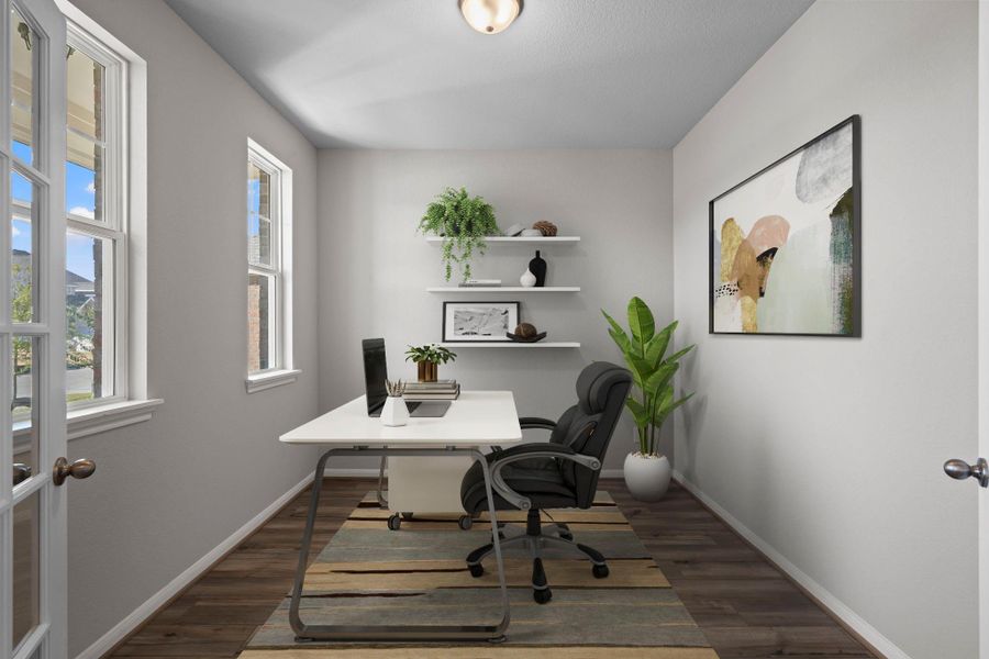 The home office features French doors, beautiful floors, large windows that give a fresh feel, this space promotes focus and creativity.