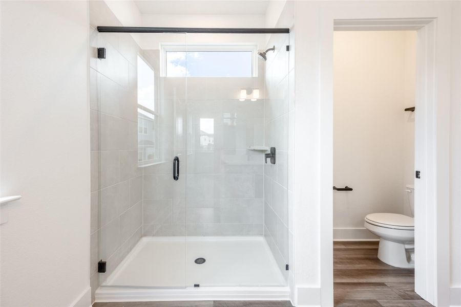 Furnished interior view inside a new home in Ryegrass Collection – Freedom at Anthem, Kyle (Image 8).