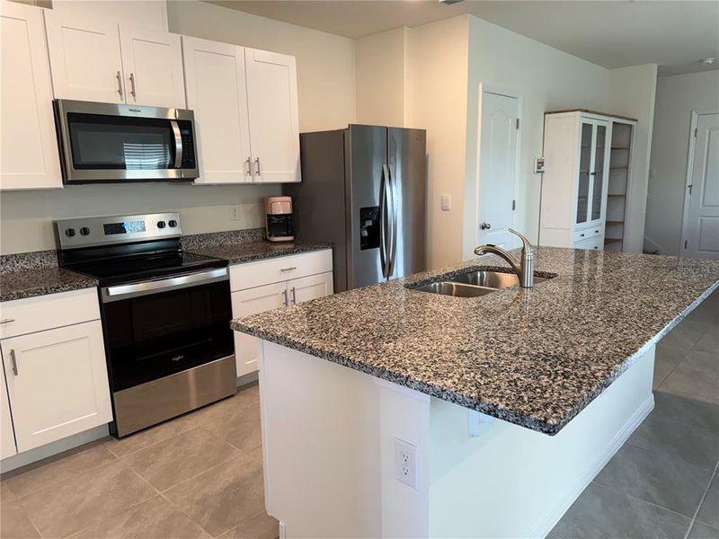 Furnished interior view inside a new home in Kindred, Kissimmee (Image 33).