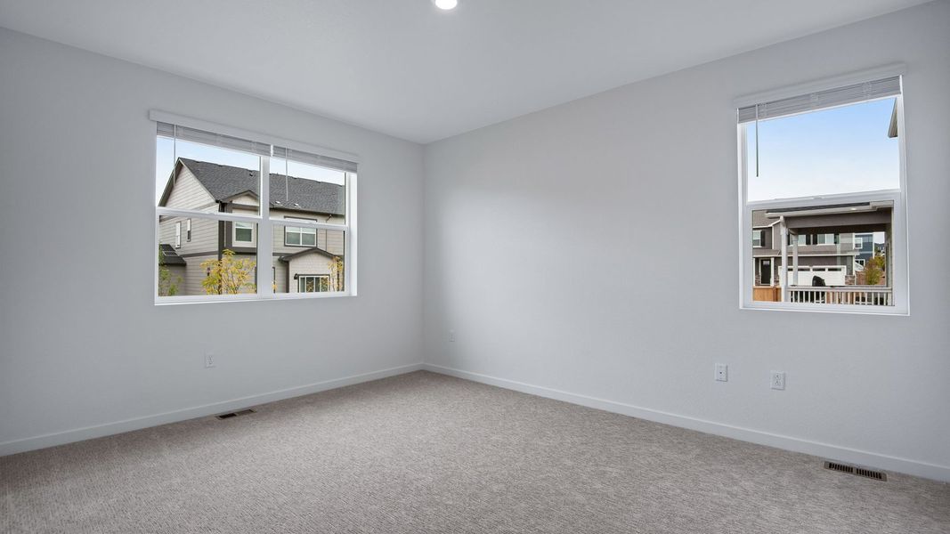 Spacious, unfurnished interior of a new home in Trails at Crowfoot, Parker (Image 17).