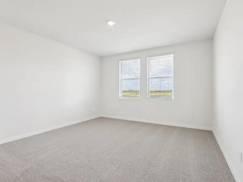 Spacious, unfurnished interior of a new home in Crosswinds - Classic Series, Haines City (Image 11).