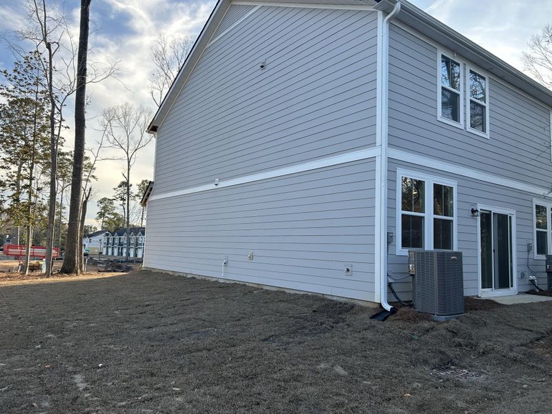 Exterior details and patio area of a home in , Summerville (Image 3).