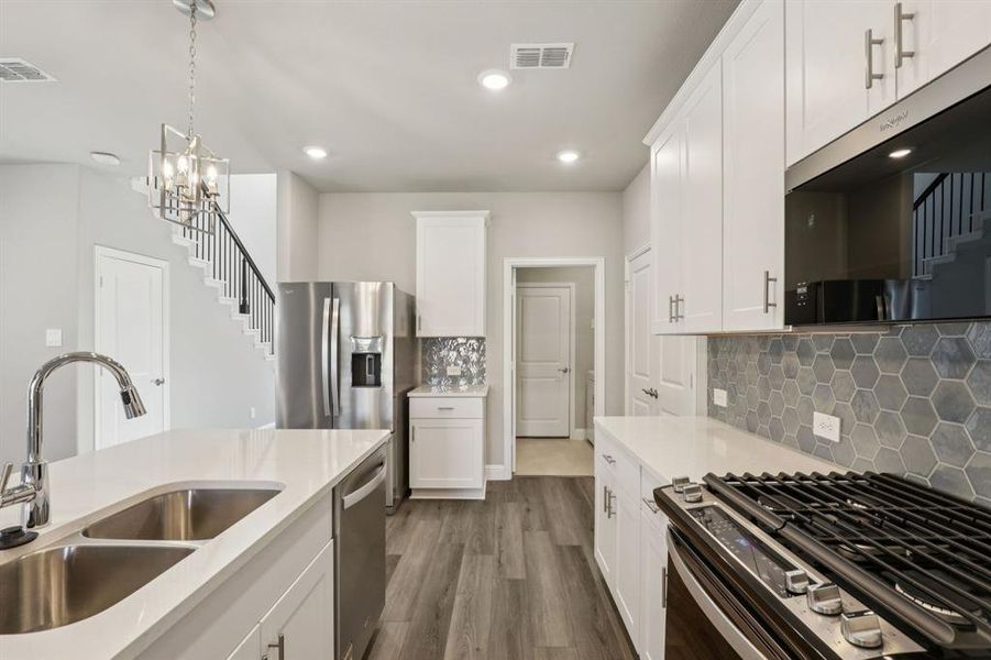 Photo is not of the actual home, but is an inspirational photo of builder’s model home and may depict options, furnishings, and/or decorator features that are not included.