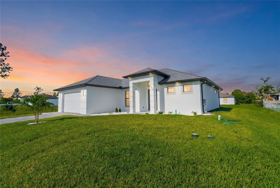 Exterior details and patio area of a home in , Lehigh Acres (Image 24). Exterior details and patio area of a home in , Lehigh Acres (Image 24).