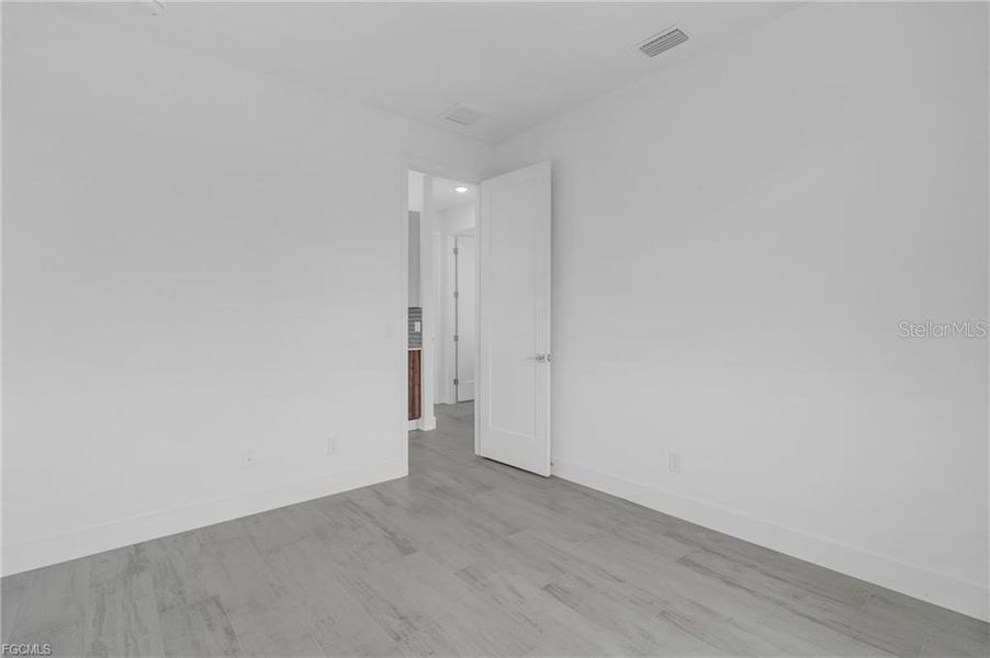 Spacious, unfurnished interior of a new home in , Port Charlotte (Image 25).
