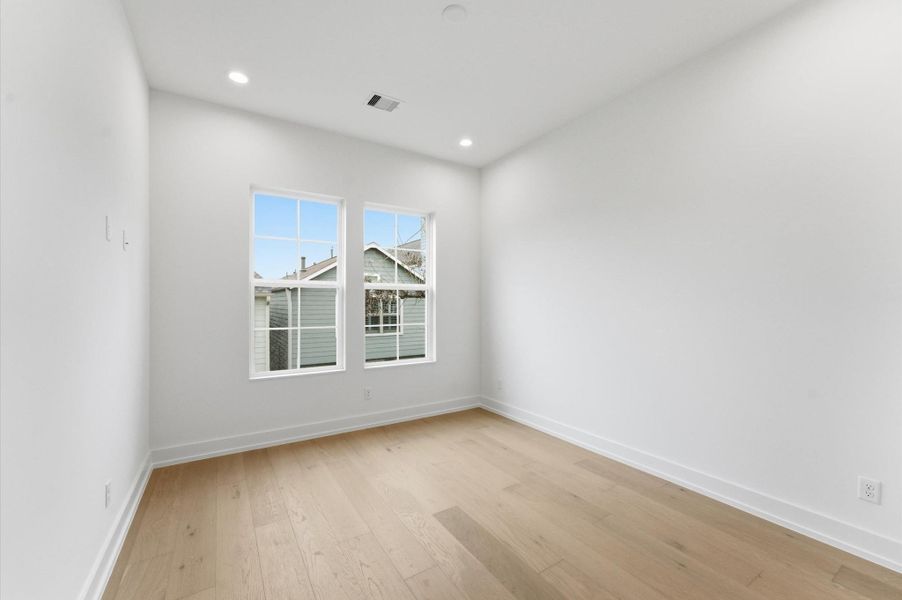 Upstairs secondary bedroom.