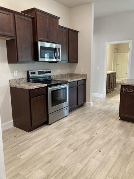 Furnished interior view inside a new home in , Ocala (Image 4).