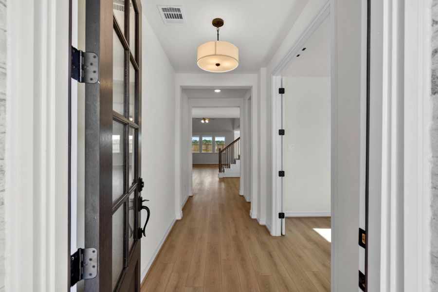 Inviting entryway with a bright, open feel that sets the tone for the home’s thoughtful design.