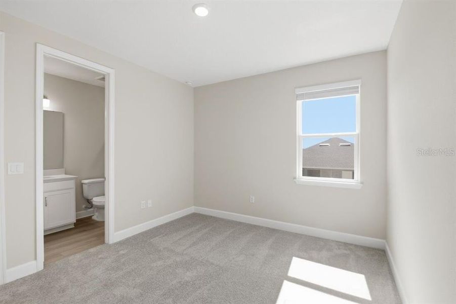 Spacious, unfurnished interior of a new home in Harvest at Ovation, Winter Garden (Image 10).