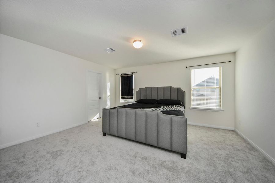 Furnished interior view inside a new home in Sunterra North, Katy (Image 8).