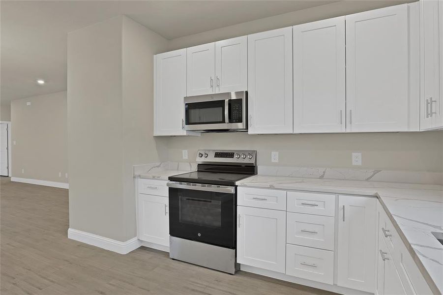 Furnished interior view inside a new home in , Granbury (Image 9).