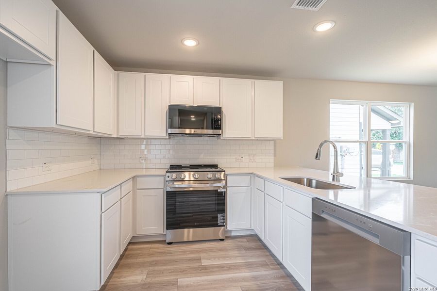 Furnished interior view inside a new home in , Seguin (Image 4).